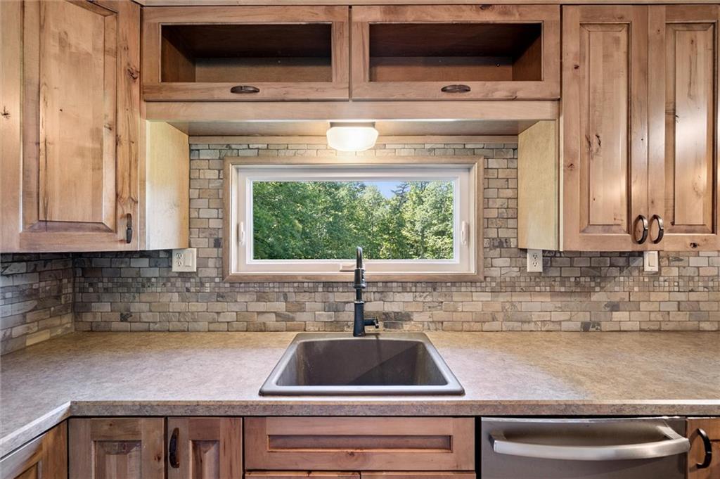 2521 Hopkins Church Road Sewickley, PA 15143 - Photo 12 of 34 a kitchen with a stove and a microwave