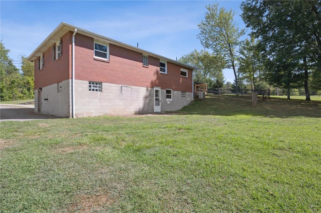 2521 Hopkins Church Road Sewickley, PA 15143 - Photo 27 of 34 a backyard of a house with lots of green space