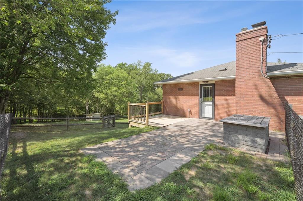 2521 Hopkins Church Road Sewickley, PA 15143 - Photo 28 of 34 a view of a house with a yard and a garage