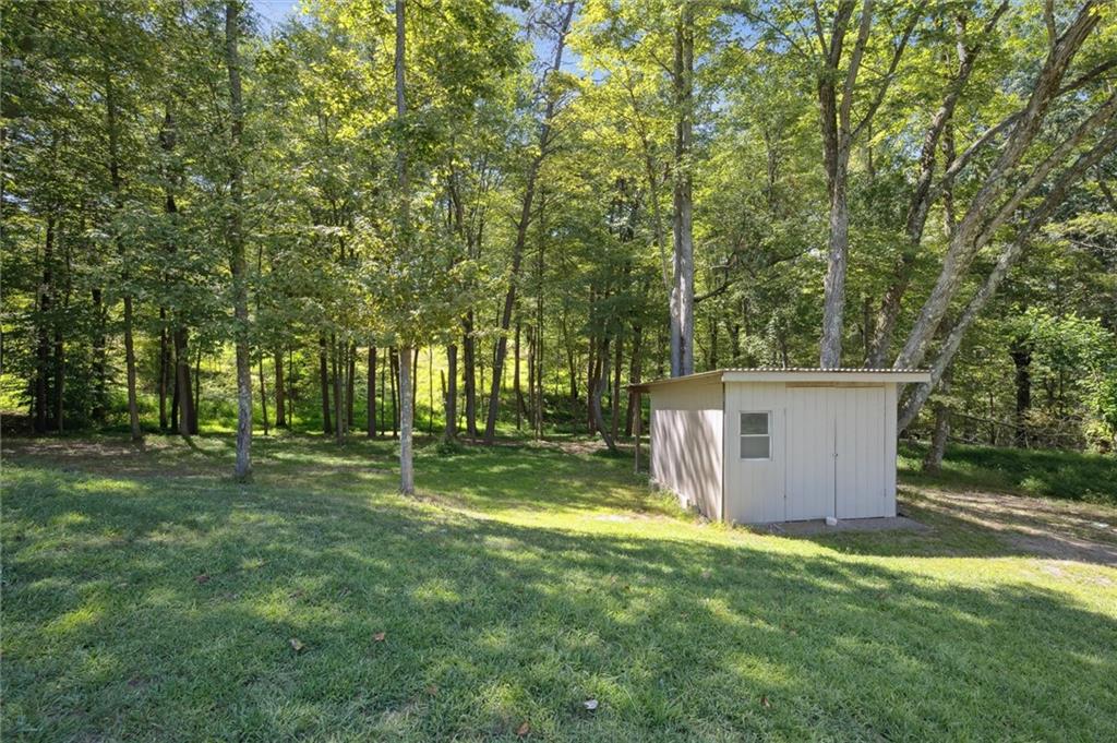 2521 Hopkins Church Road Sewickley, PA 15143 - Photo 32 of 34 a backyard of a house with swimming pool and trees