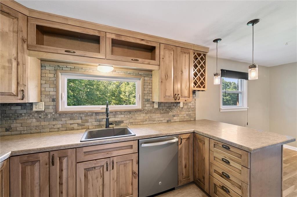 2521 Hopkins Church Road Sewickley, PA 15143 - Photo 10 of 34 a kitchen with a sink and a window