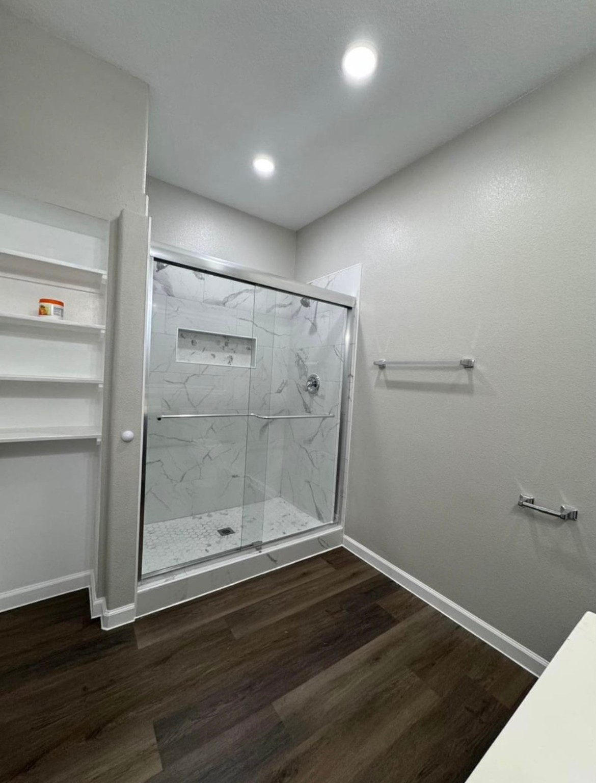 4741 Providence Street Houston, TX 77020 - Photo 11 of 22 a bathroom with a glass shower door