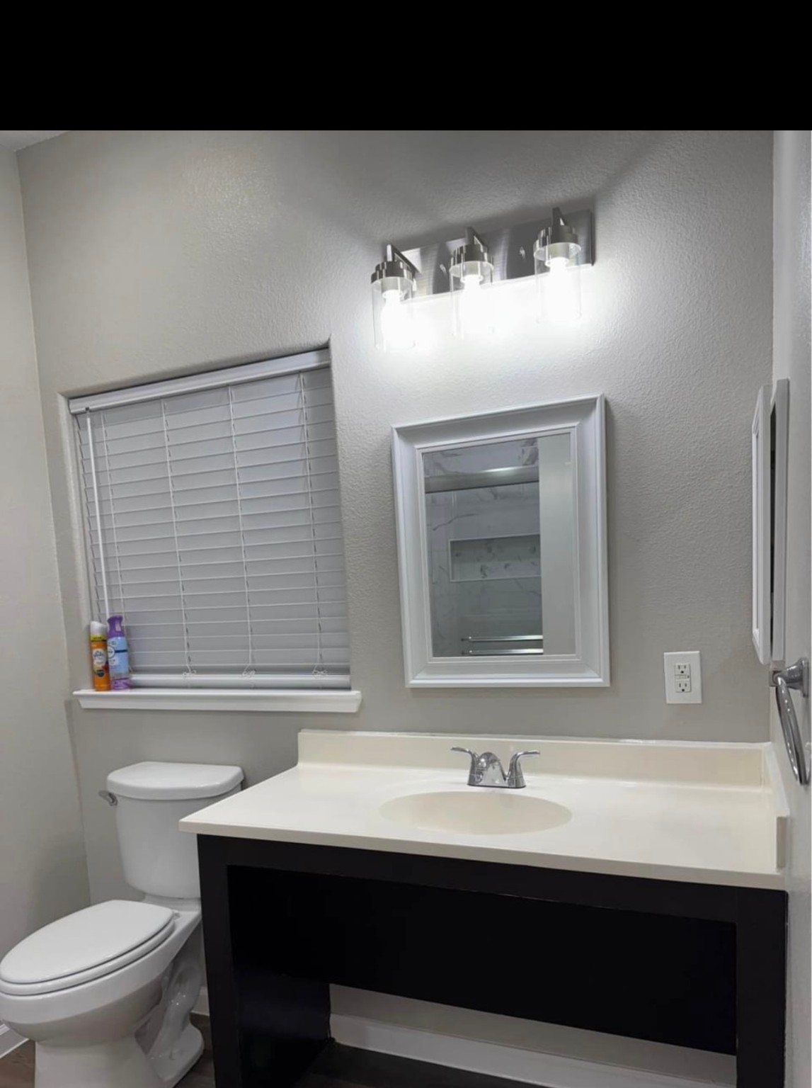 4741 Providence Street Houston, TX 77020 - Photo 19 of 22 a bathroom with a sink and a toilet