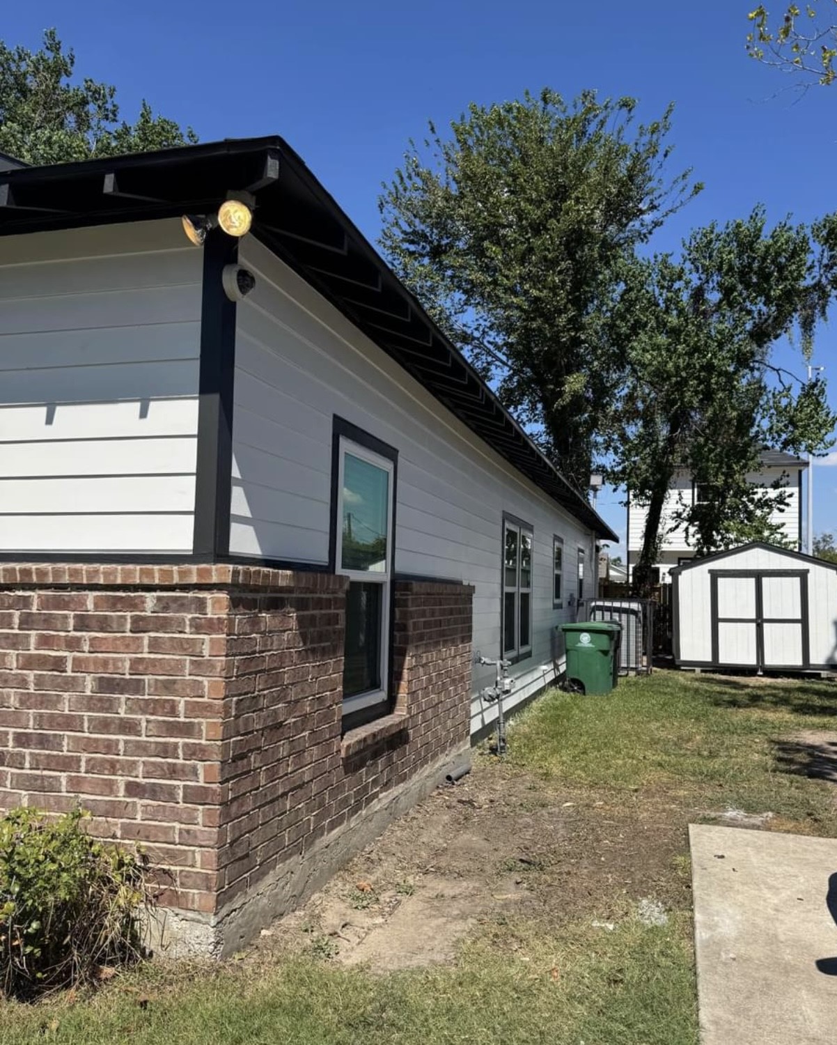 4741 Providence Street Houston, TX 77020 - Photo 22 of 22 a backyard of a house with plants and tree