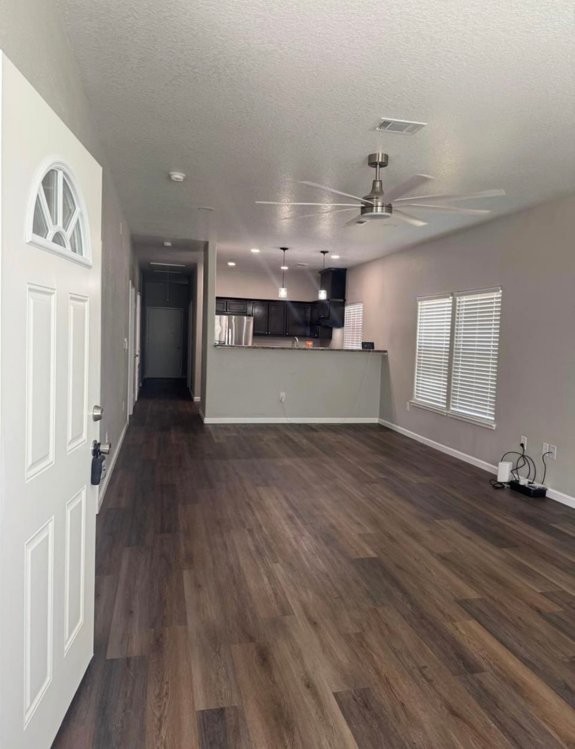 4741 Providence Street Houston, TX 77020 - Photo 5 of 22 wooden floor in an empty room with a window