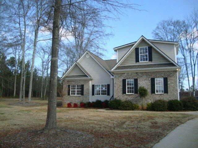 2205 Jug Road Northwest Monroe, GA 30656 - Photo 1 of 1 a front view of a house with a yard