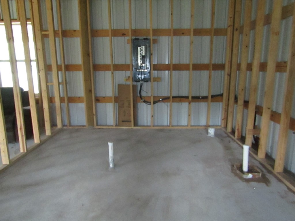 7072 County Road 3 Sweeny, TX 77480 - Photo 11 of 23 a view of a house with a floor to ceiling window