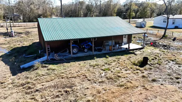 a view of a backyard that has of a tree
