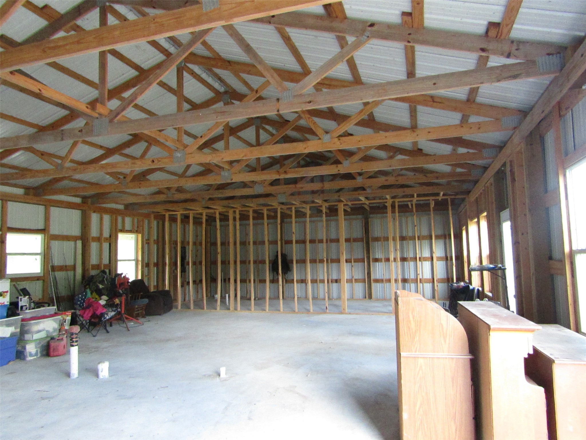 7072 County Road 3 Sweeny, TX 77480 - Photo 7 of 23 a lobby with furniture and a chandelier