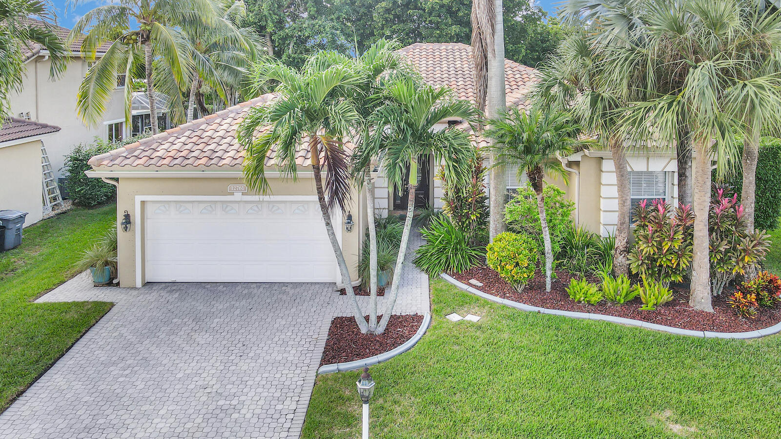 12761 Tulipwood Circle Boca Raton, FL 33428 - Photo 1 of 51 FRONT