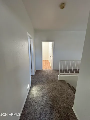 a view of entryway with stairs