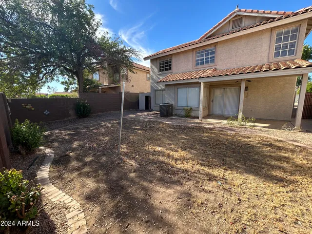 a view of a house with a patio