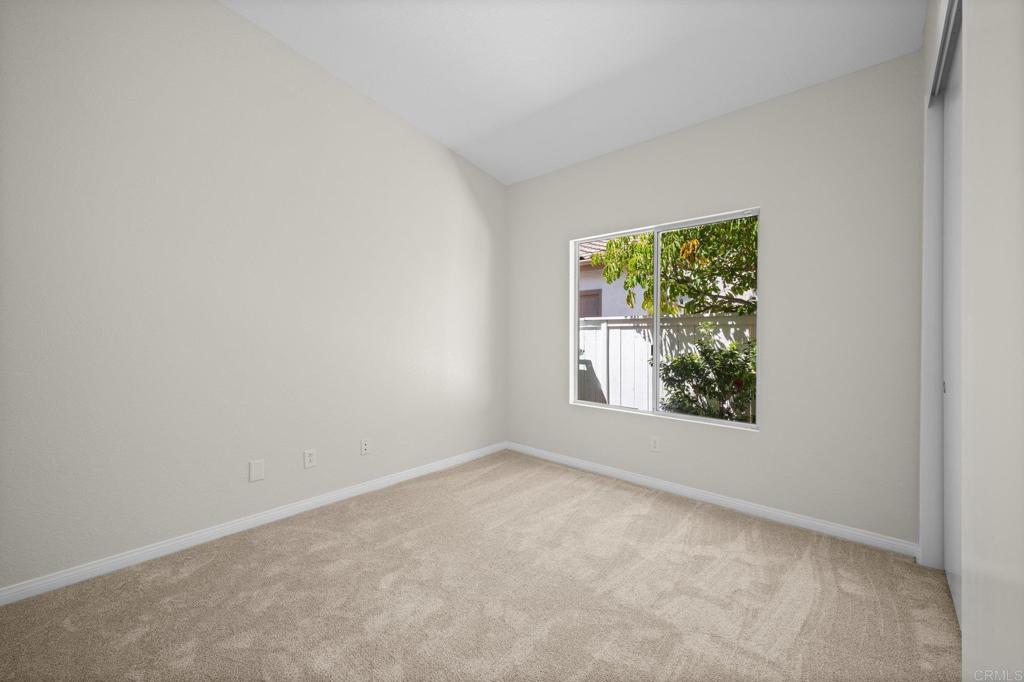 342 Benevente Drive Oceanside, CA 92057 - Photo 21 of 43 an empty room with windows