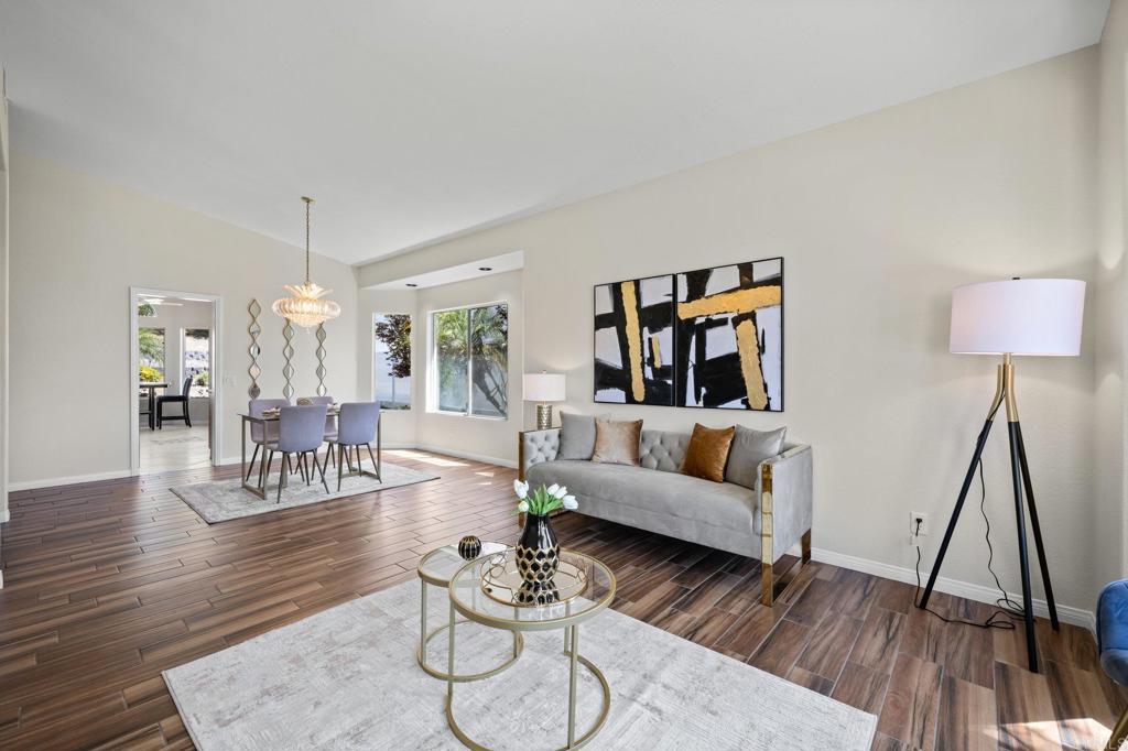 342 Benevente Drive Oceanside, CA 92057 - Photo 4 of 43 a living room with furniture and a wooden floor