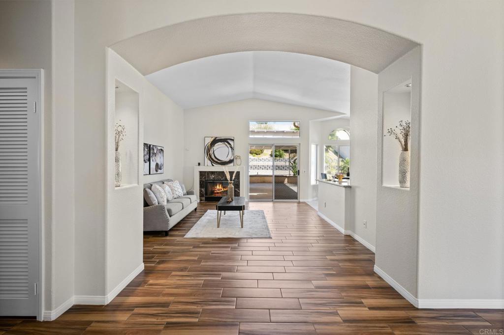 342 Benevente Drive Oceanside, CA 92057 - Photo 8 of 43 a living room with furniture and a wooden floor