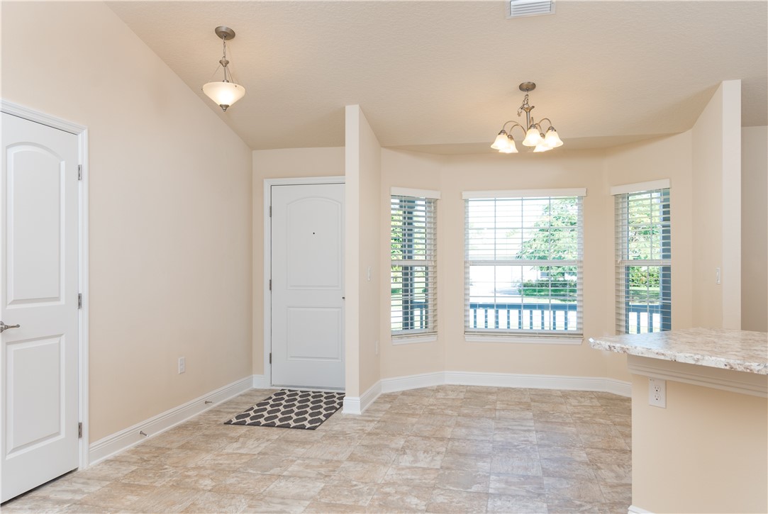 1361 Seahouse Street Sebastian, FL 32958 - Photo 3 of 13 a view of an empty room with a window