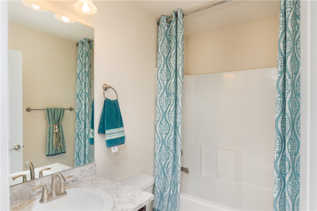 1361 Seahouse Street Sebastian, FL 32958 - Photo 10 of 13 a bathroom with a sink and a mirror
