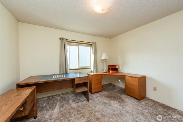 a room with furniture and window