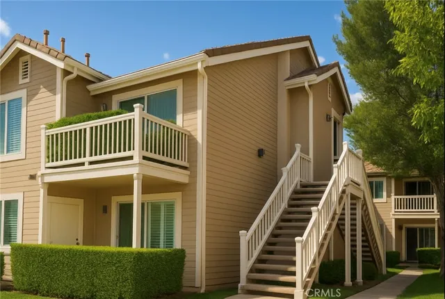 a front view of a house with a deck