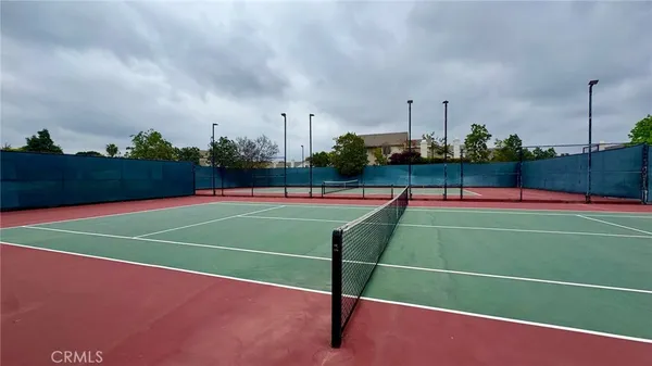 a tennis court that has tennis net