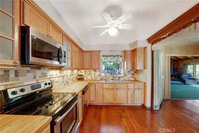 a living room with furniture a window and storage