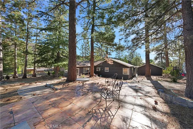 a view of outdoor space with furniture