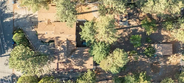 a view of a house with sitting area and garden