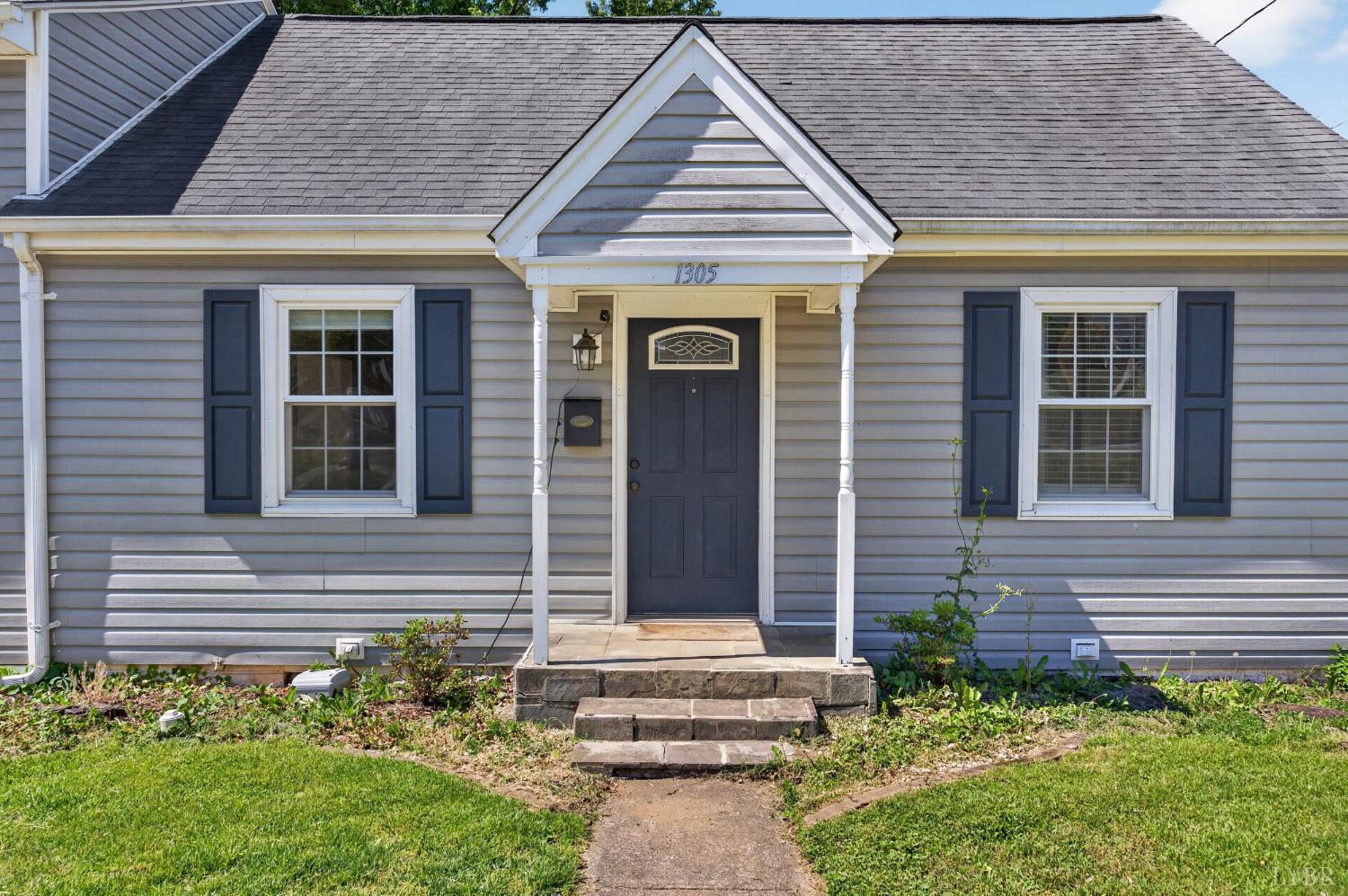 1305 Harding Street Lynchburg, VA 24502 - Photo 3 of 33 a front view of a house with a yard