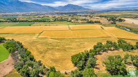 19 East Southfield Road Spanish Fork, UT 84660 - Photo 17 of 74 Overview of rural landscape with a mountain backdrop