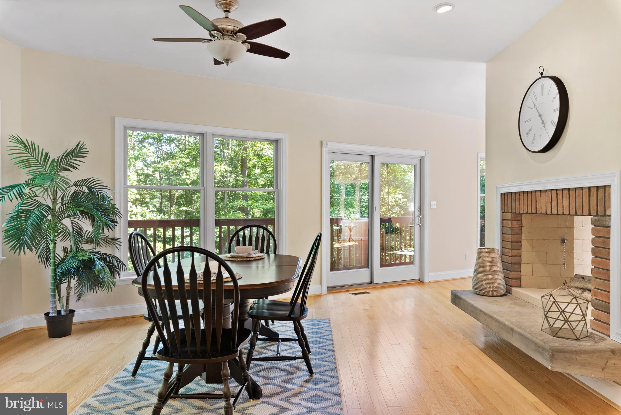 377 Forest Beach Road Annapolis, MD 21409 - Photo 21 of 88 A wonderful dining area with dual side fireplace