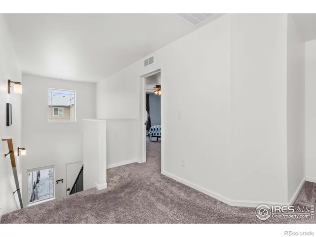 a living room with a wooden floor