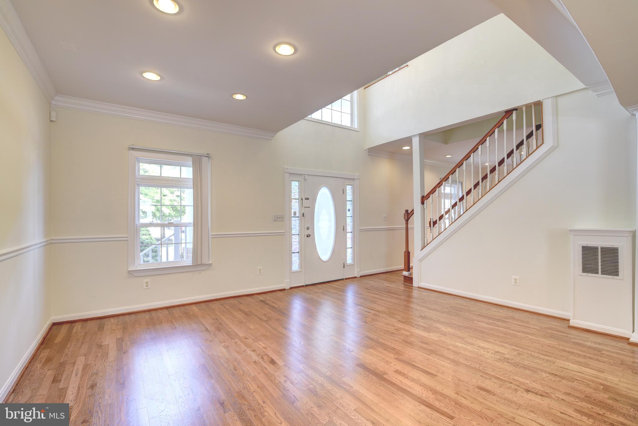 8103 Fordson Road Alexandria, VA 22306 - Photo 9 of 39 Living Room / 2 Story Foyer
