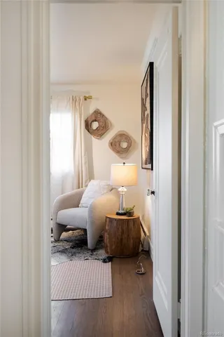 a bedroom with a bed and a mirror