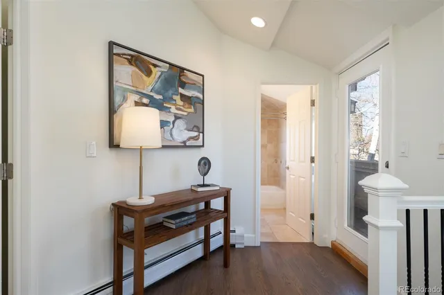 a bed room with a bed and a window