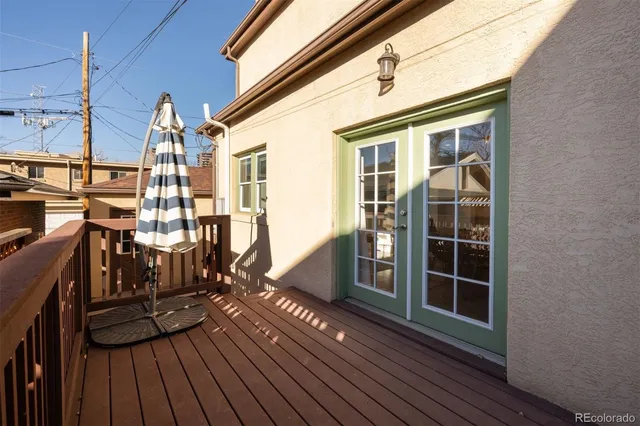 a view of patio with a table and chairs