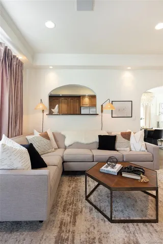 a living room with furniture and a couch