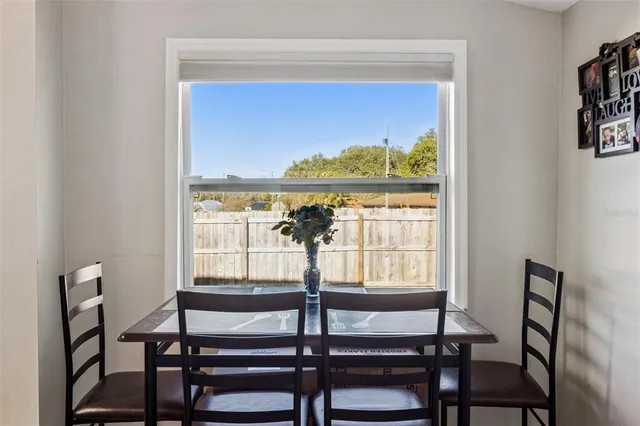 a view of a room with furniture window and outside view
