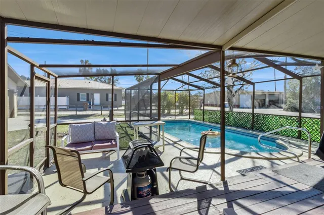 an outdoor space with swimming pool