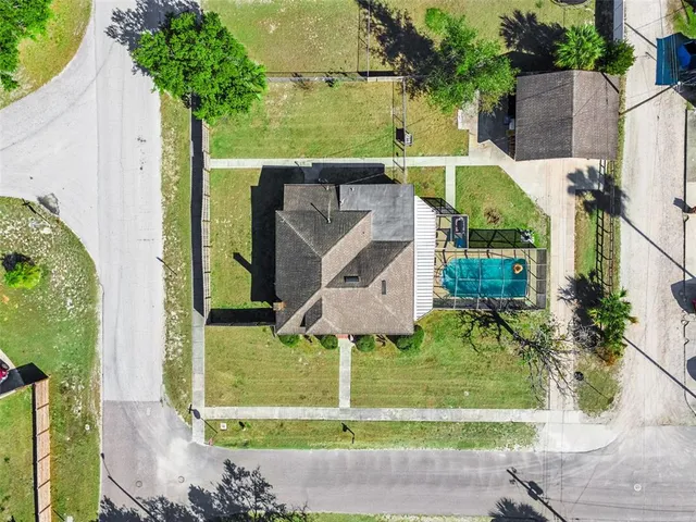 an aerial view of a city with lots of residential buildings