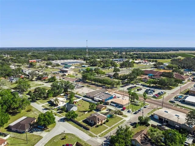 an aerial view of residential building with outdoor space