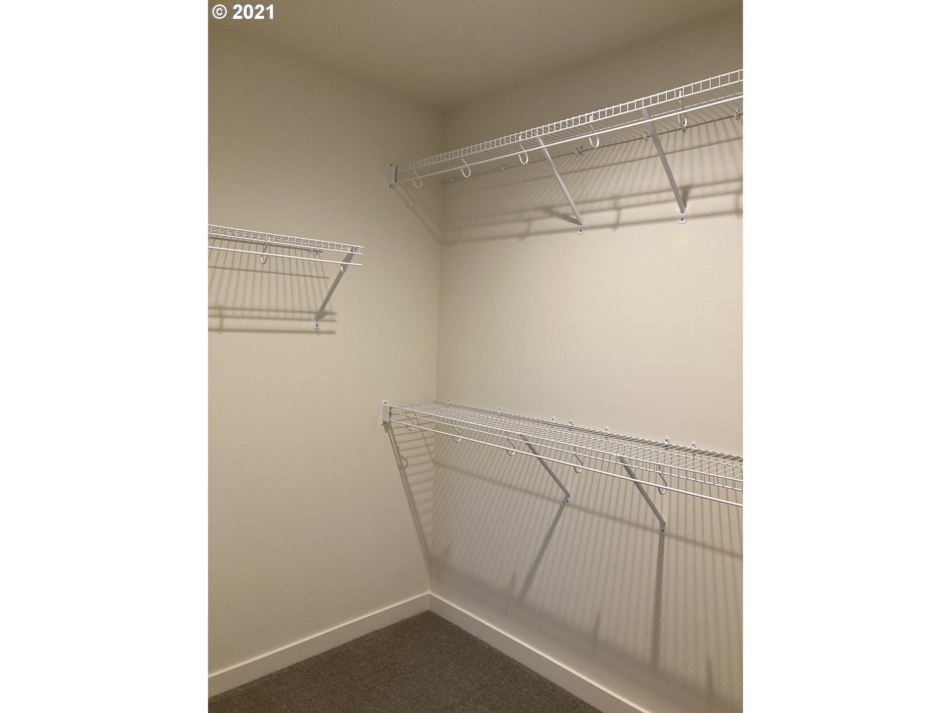 7023 South Ridge Way Ridgefield, WA 98642 - Photo 8 of 13 a view of a room with racks on the wall