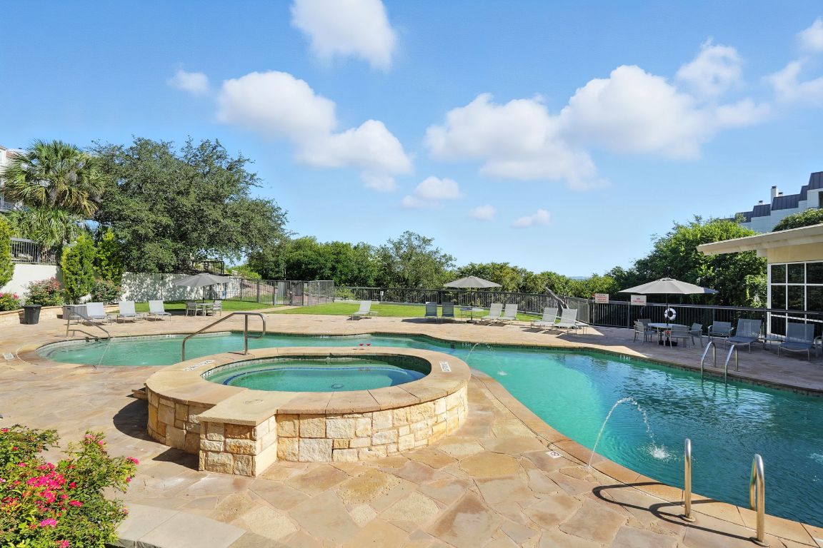 2918 Ranch Road 620 North, Unit O285 Austin, TX 78734 - Photo 33 of 37 View of swimming pool with a patio area and an in-ground hot tub