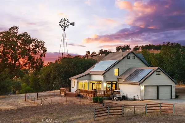 a view of a terrace with a forest