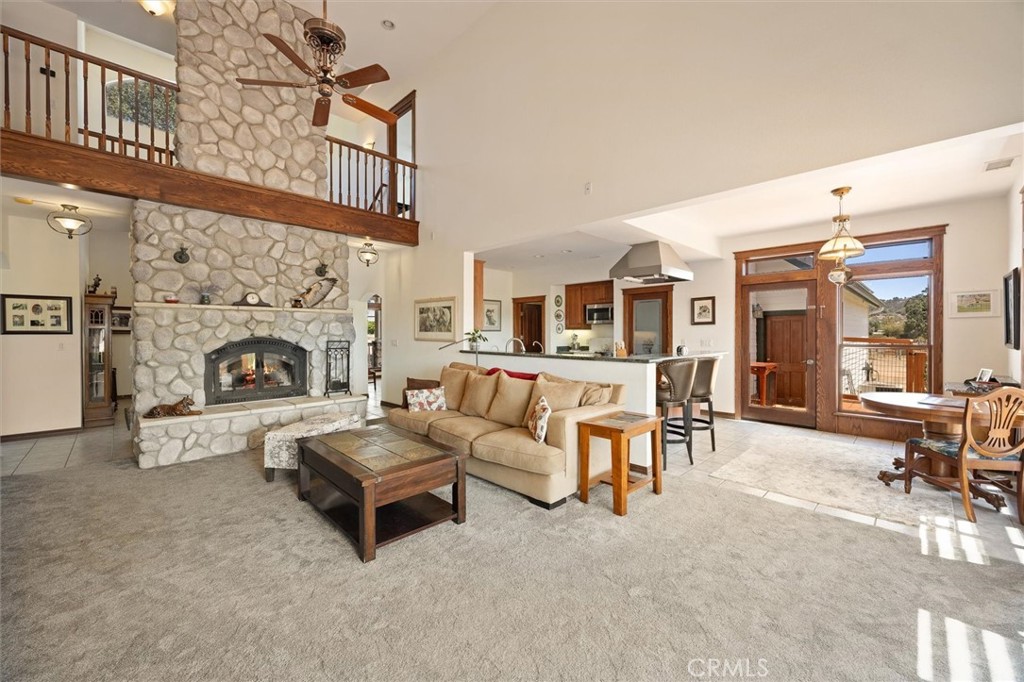5625 Linne Road Paso Robles, CA 93446 - Photo 34 of 75 a living room with furniture and a fireplace