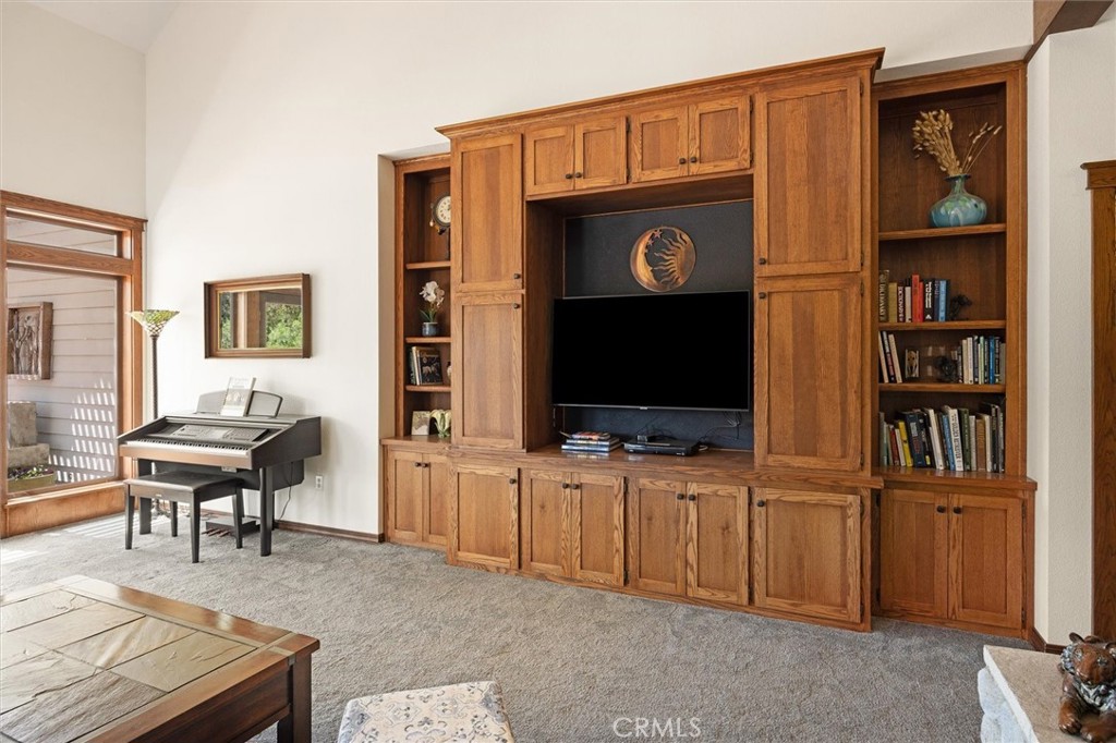 5625 Linne Road Paso Robles, CA 93446 - Photo 36 of 75 a living room with furniture and a flat screen tv