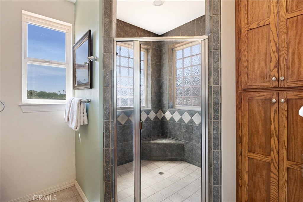 5625 Linne Road Paso Robles, CA 93446 - Photo 40 of 75 a bathroom with a glass shower door