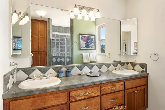 an aerial view of a house with a lake view