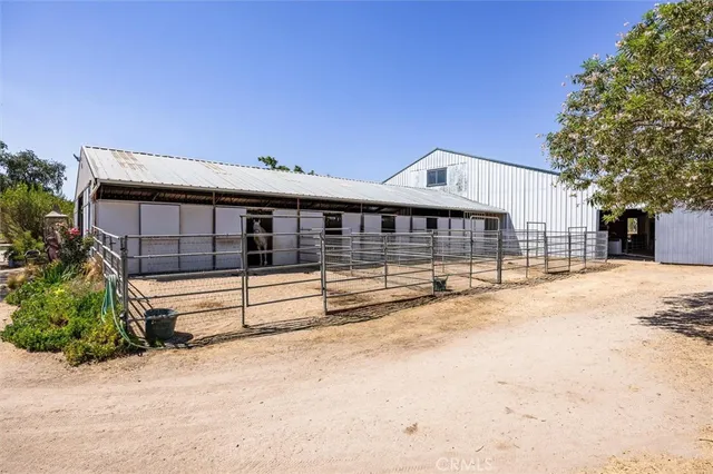 a view of a garage with cars