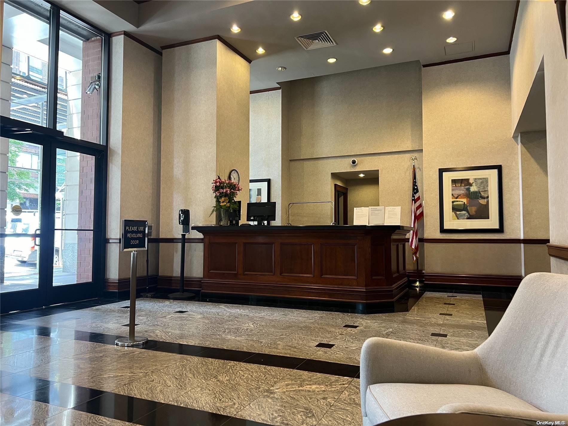 200 Rector Place, Unit 35E Manhattan, NY 10280 - Photo 21 of 33 a living room with furniture