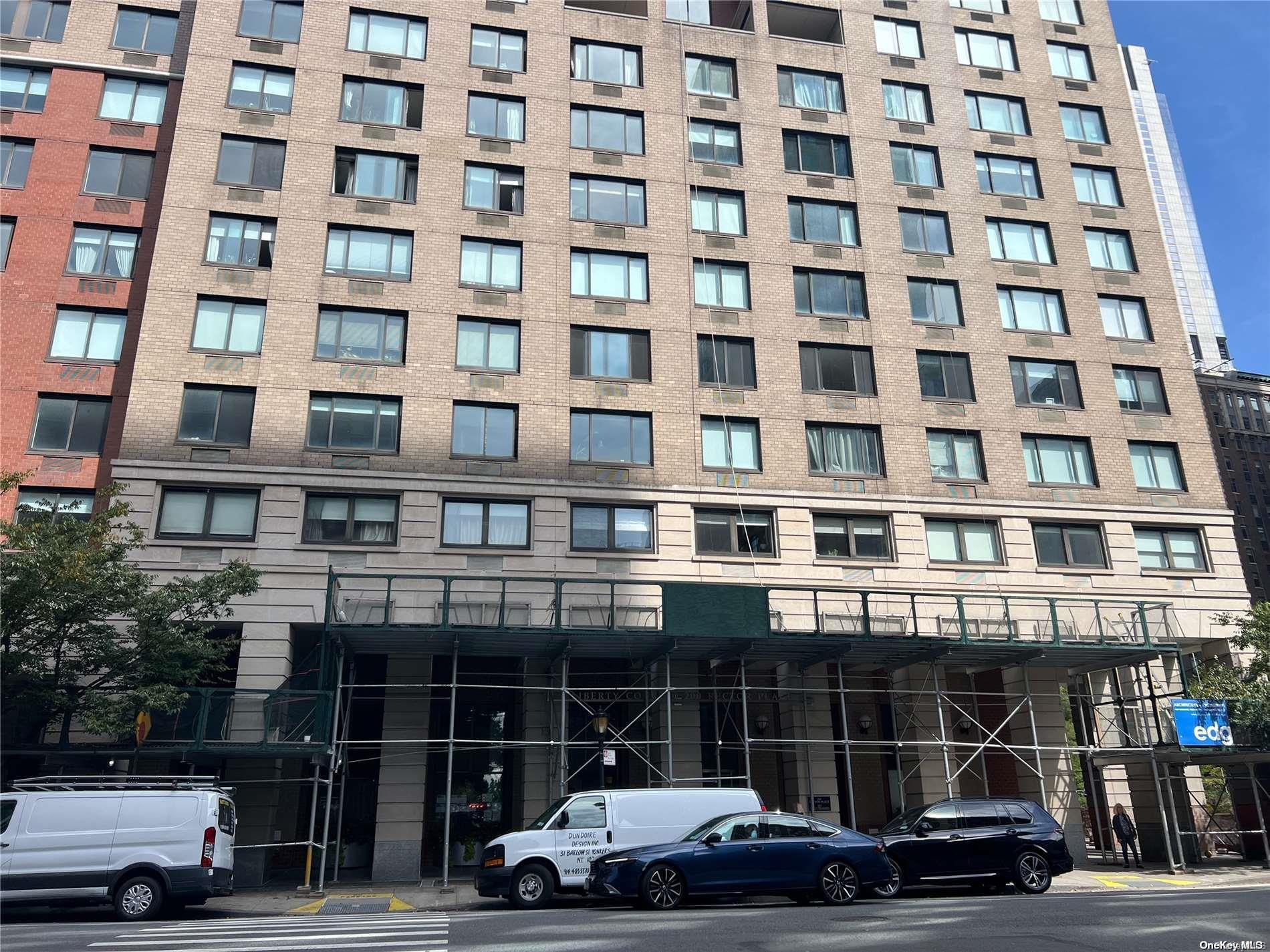 200 Rector Place, Unit 35E Manhattan, NY 10280 - Photo 32 of 33 a car parked in front of a building